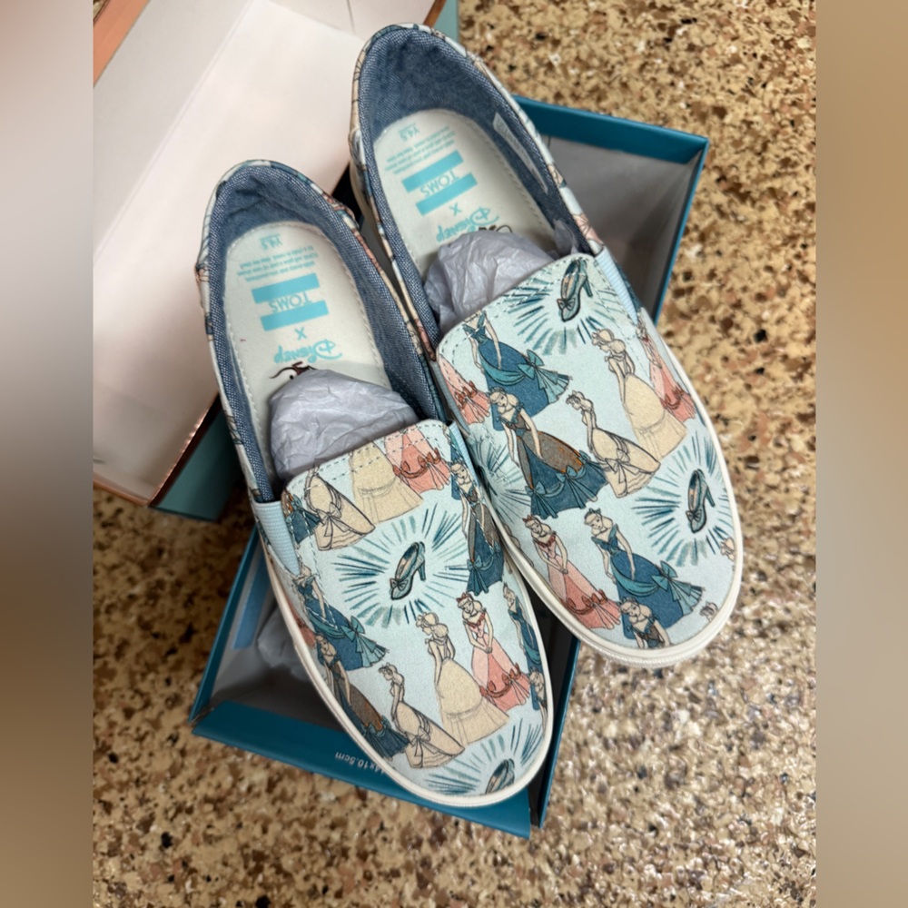 NWT TOMS Disney Princess Cinderella slip-ons in youth 4.5. Will fit women’s 7!
